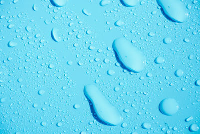 Close-up of water drops on glass