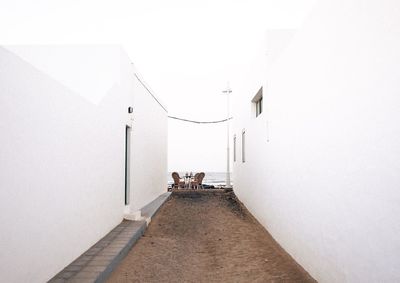 People on wall of building