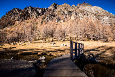 Wooden bridge at alpe devero ossola valley italy