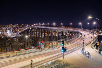 High angle view of illuminated city at night