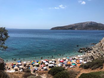 High angle view of people on beach against sky