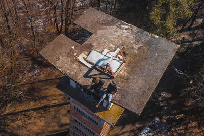 High angle view of abandoned umbrella on field