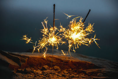 Firework display at night