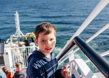 Young man swimming in sea
