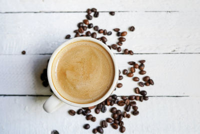 High angle view of coffee cup on table