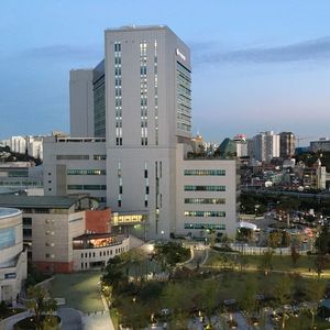 Modern buildings in city against sky