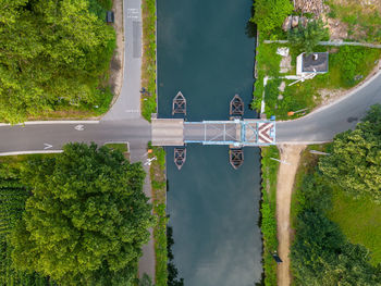 Top view aerial of a draw bridge over the canal dessel-schoten in rijkevorsel, antwerp, belgium