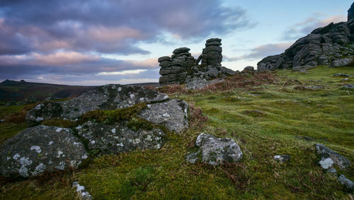 Rock formation on land against sky