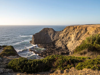 Scenic view of sea against clear sky