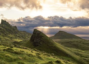 Scenic view of mountains against sky during sunset