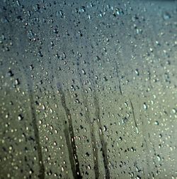 Close-up of water drops on glass