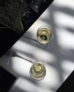 High angle view of glass bottle on table