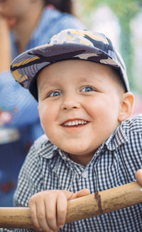 Portrait of cute boy standing outdoors