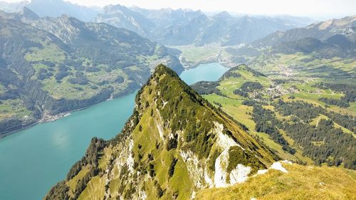 High angle view of lake amidst mountains