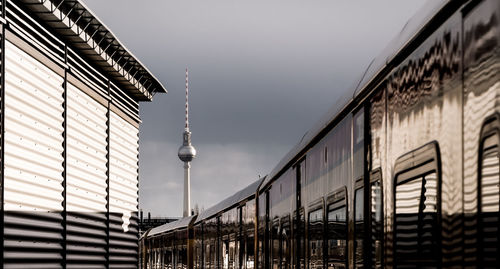 Train against fernsehturm and sky