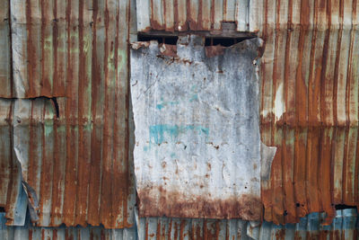 Full frame shot of rusty metal door