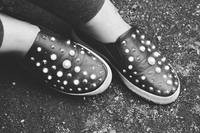 Black shoes with white beads and spikes