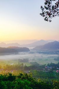 Scenic view of landscape against sky during sunset