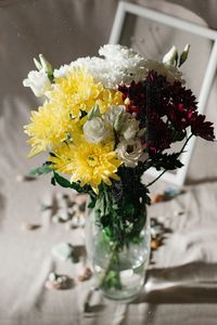 High angle view of flower vase on table