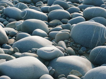 Full frame shot of pebbles at beach