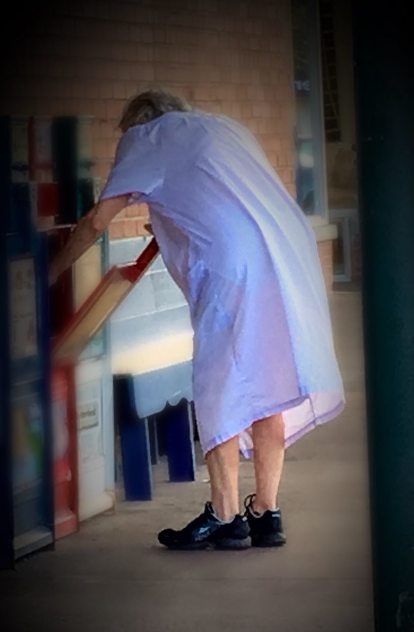 WOMAN WITH UMBRELLA IN THE DARK