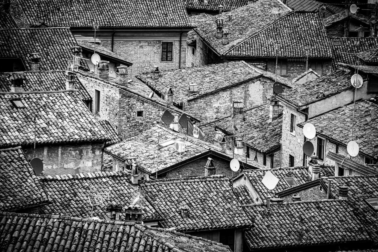 LOW ANGLE VIEW OF OLD RESIDENTIAL BUILDING