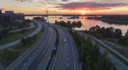 High angle view of highway in city during sunset