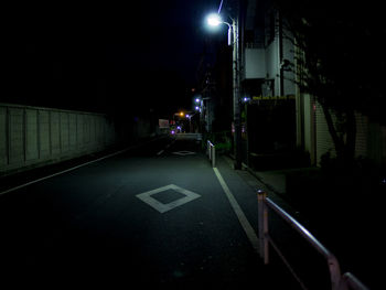 Illuminated street at night