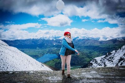 Front view of woman walking on mountain