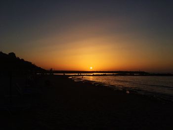 Scenic view of beach during sunset