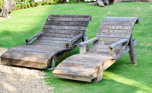 High angle view of empty bench in park