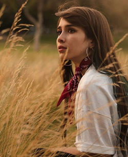 Portrait of a young woman looking away