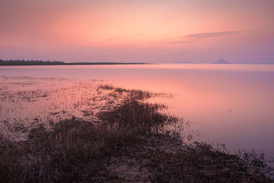 Scenic view of sea against sky during sunset