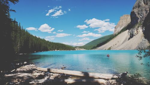 Scenic view of lake against blue sky