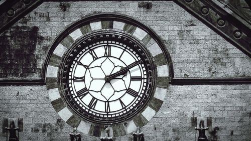 Low angle view of clock in building