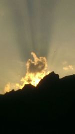 Silhouette of mountain at sunset