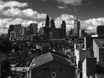 View of city against cloudy sky