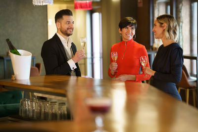 Business colleagues drinking champagne