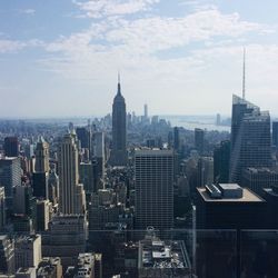 Modern buildings in city against sky