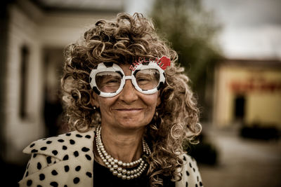 Portrait of woman wearing sunglasses