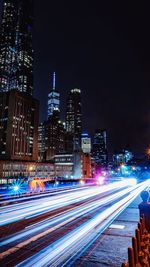 Light trails on city street at night