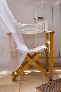 View of chair and curtain on terrace 