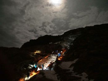View of illuminated buildings against sky