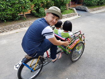 Boy riding bicycle