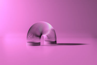 Close-up of pink light against purple background