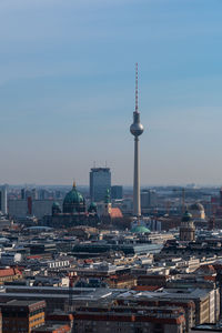 View of communications tower in city