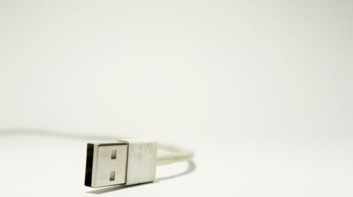 Close-up of electric lamp against white background