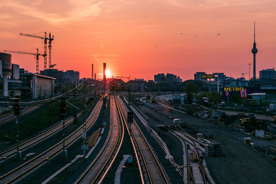 High angle view of railroad tracks at sunset