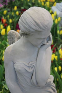 Close-up of statue against plants