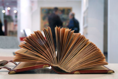 Close-up of open book in library